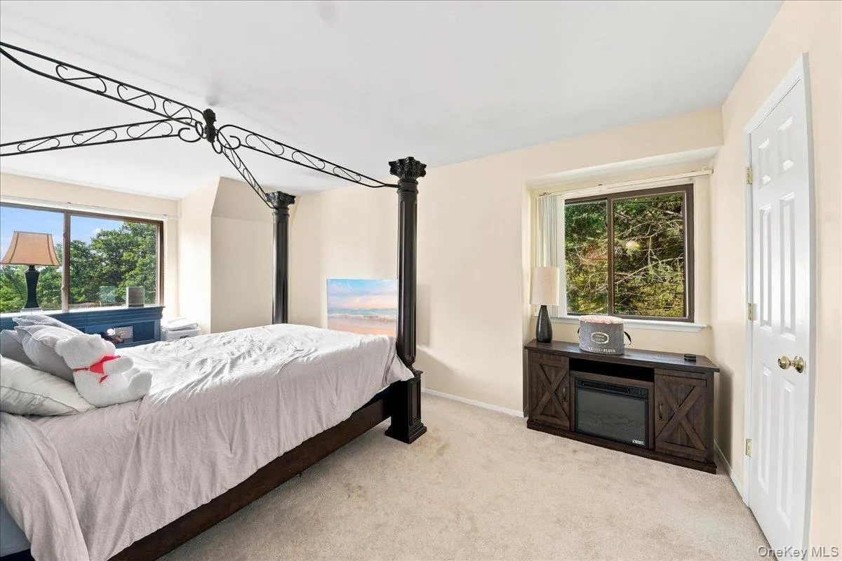 Wall-to-wall carpeting and neutral wall tones Wall-to-wall carpeting and neutral wall tones