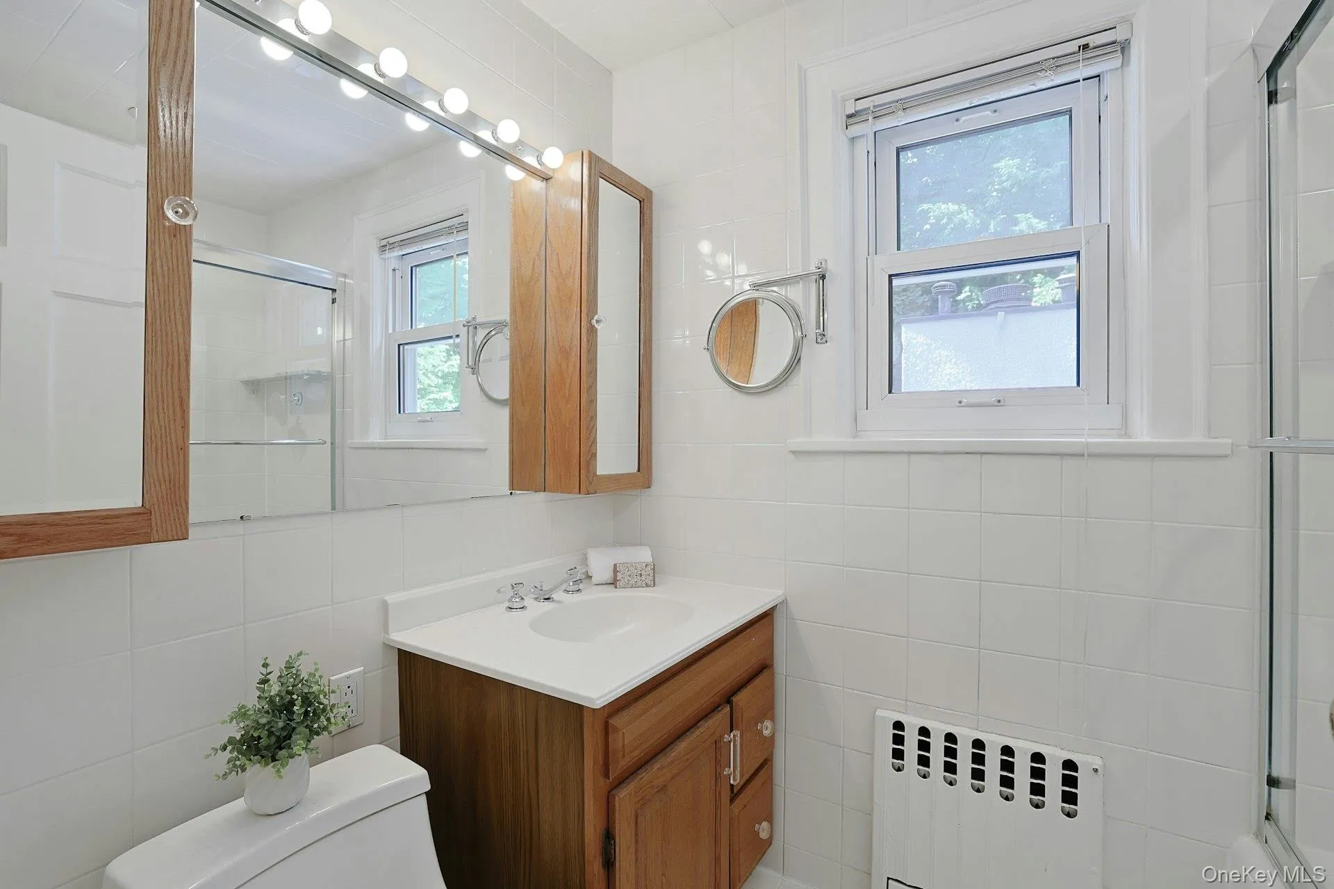 The second-floor hall bath features a tub/shower and serves the two additional bedrooms on this level. The second-floor hall bath features a tub/shower and serves the two additional bedrooms on this level.