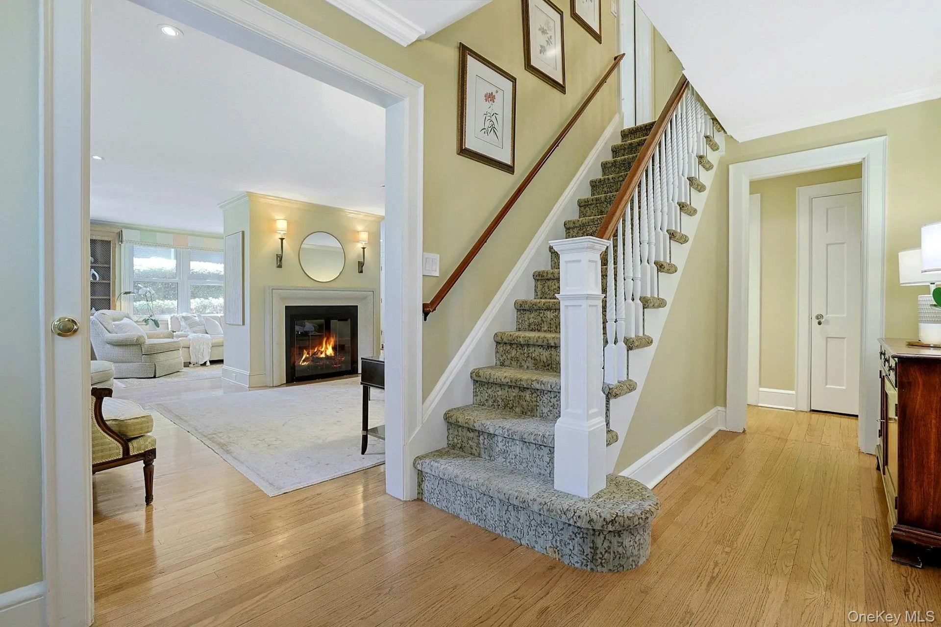 A pretty center foyer with hardwood floors introduces the home and opens effortlessly to the formal living and dining rooms. A pretty center foyer with hardwood floors introduces the home and opens effortlessly to the formal living and dining rooms.
