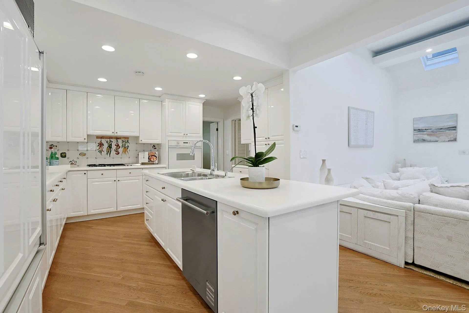 The kitchen opens seamlessly to the expansive family room beyond, creating an ideal layout for both busy everyday life and entertaining. The kitchen opens seamlessly to the expansive family room beyond, creating an ideal layout for both busy everyday life and entertaining.