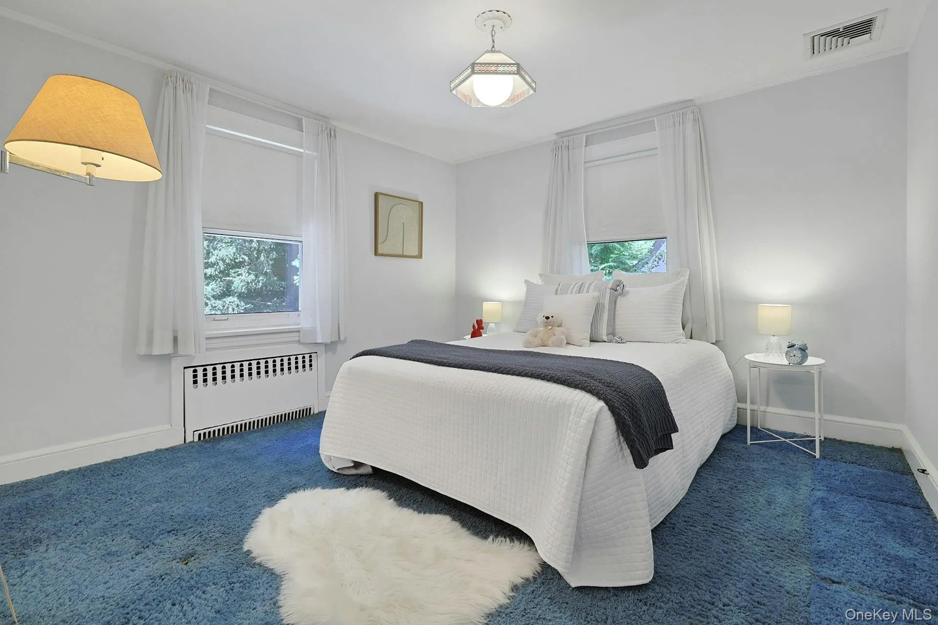 Bright and comfortably sized, this inviting bedroom enjoys two exposures and plenty of room for additional furniture. Bright and comfortably sized, this inviting bedroom enjoys two exposures and plenty of room for additional furniture.