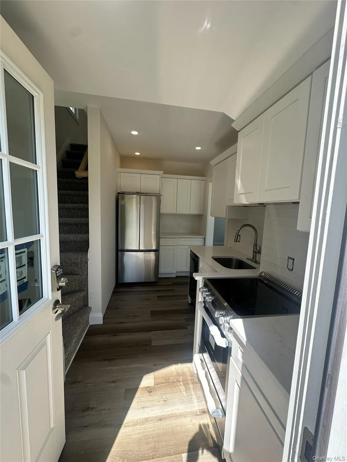 Entry into Kitchen with W&D Entry into Kitchen with W&D
