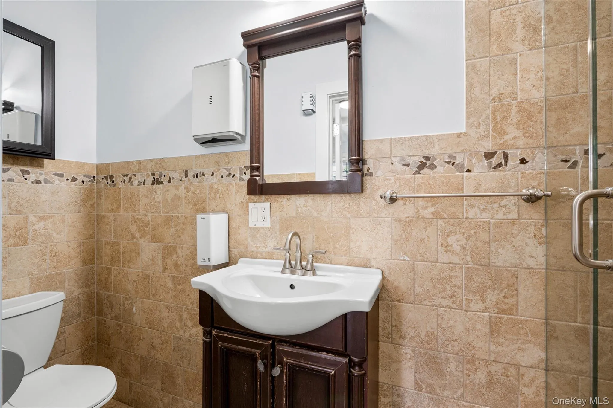 Ensuite bathroom with shower w/ glass enclosure Ensuite bathroom with shower w/ glass enclosure