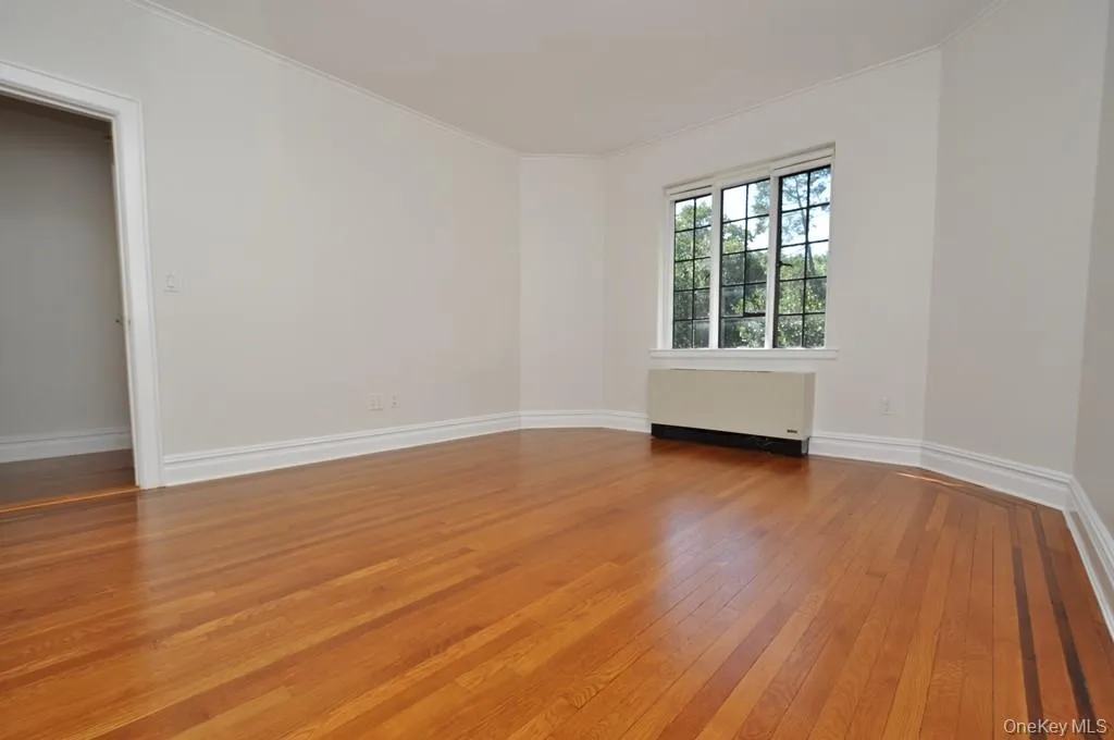 Second Bedroom has hardwood floors and is 15'-0" x 12'-11". Second Bedroom has hardwood floors and is 15'-0" x 12'-11".