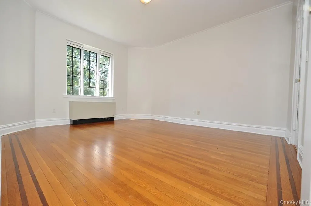 Second Bedroom has hardwood floors and is 15'-0" x 12'-11". Second Bedroom has hardwood floors and is 15'-0" x 12'-11".