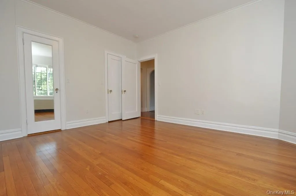 Second Bedroom has hardwood floors and is 15'-0" x 12'-11". Second Bedroom has hardwood floors and is 15'-0" x 12'-11".