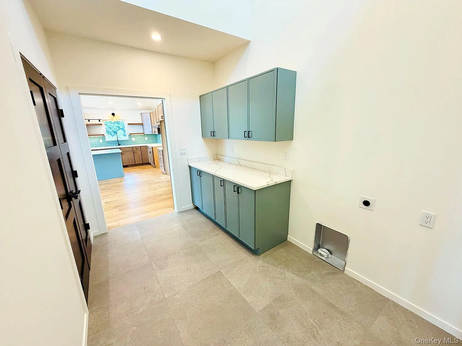 Between kitchen and garage/studio Between kitchen and garage/studio