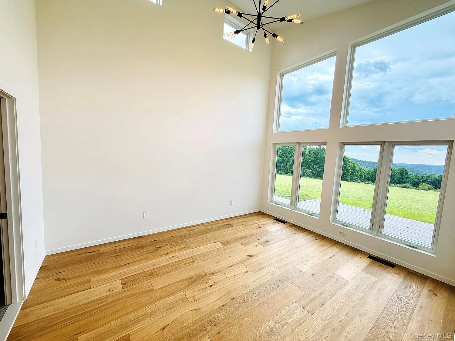 Washed with light. Big windows take advantage of the long-range views! Washed with light. Big windows take advantage of the long-range views!