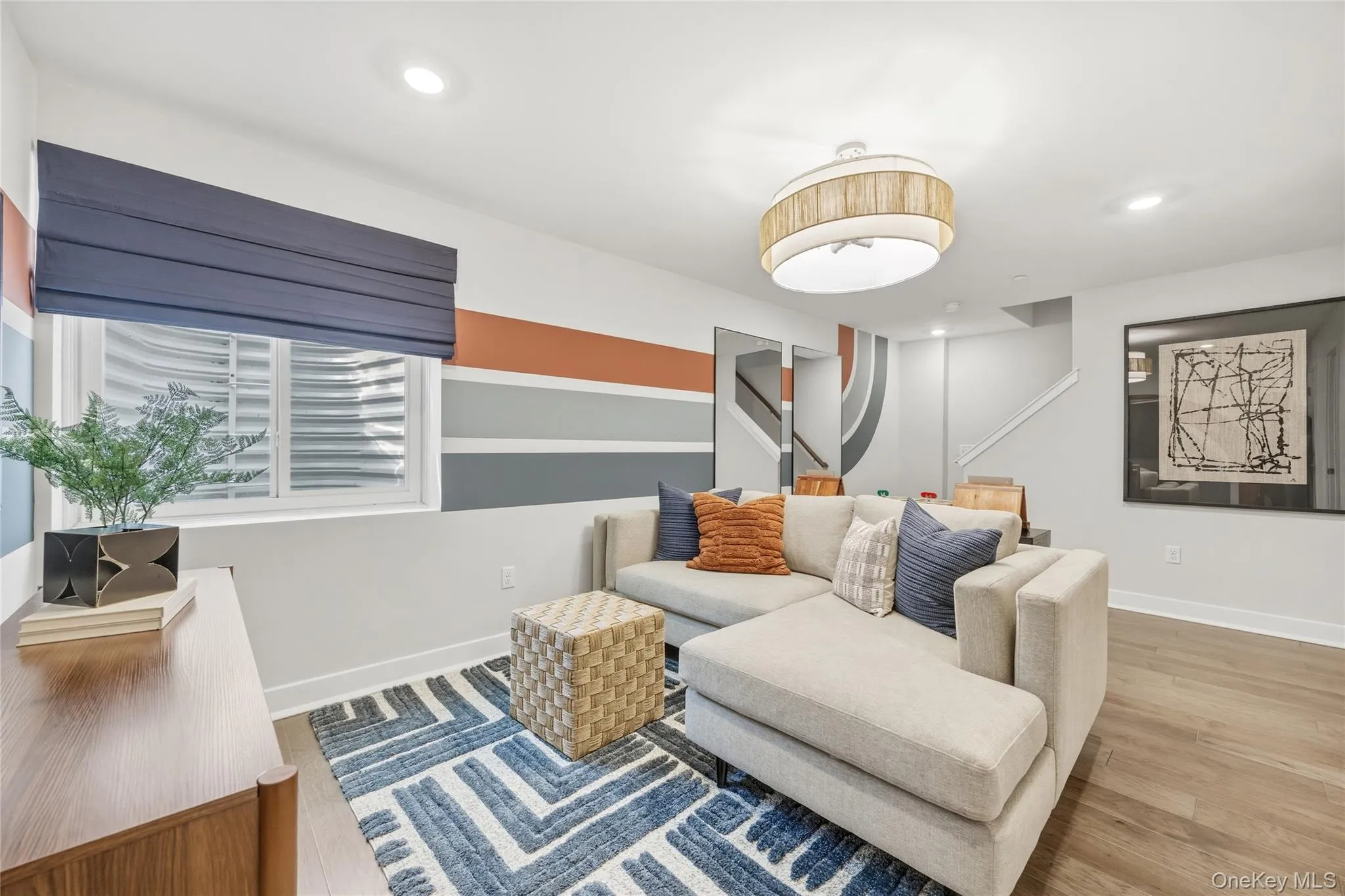 A basement perfect for both relaxing and entertaining. A basement perfect for both relaxing and entertaining.