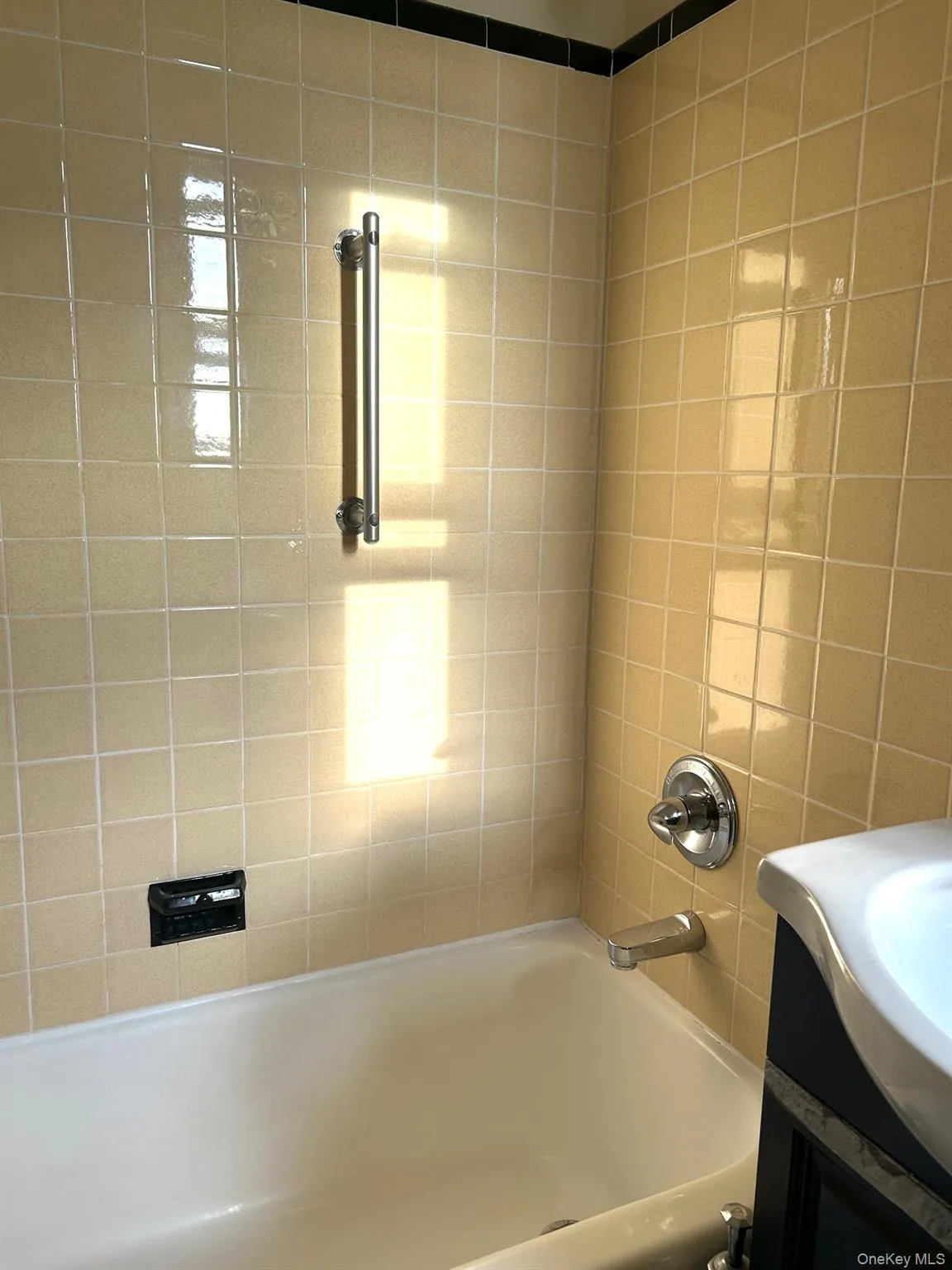 Tub Reglazed and tiles re-calked not long ago.. Tub Reglazed and tiles re-calked not long ago..