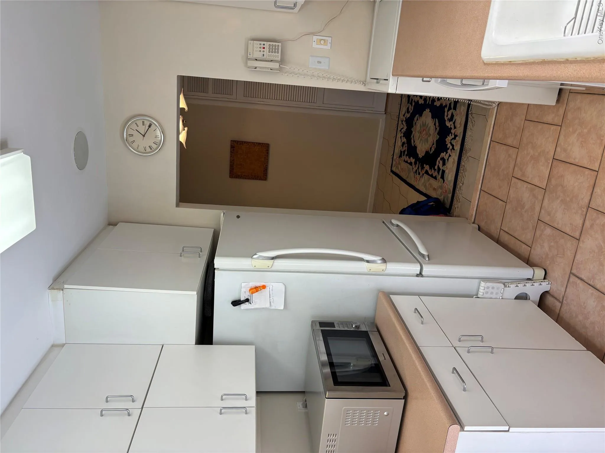 Galley kitchen with new dishwasher and stove Galley kitchen with new dishwasher and stove