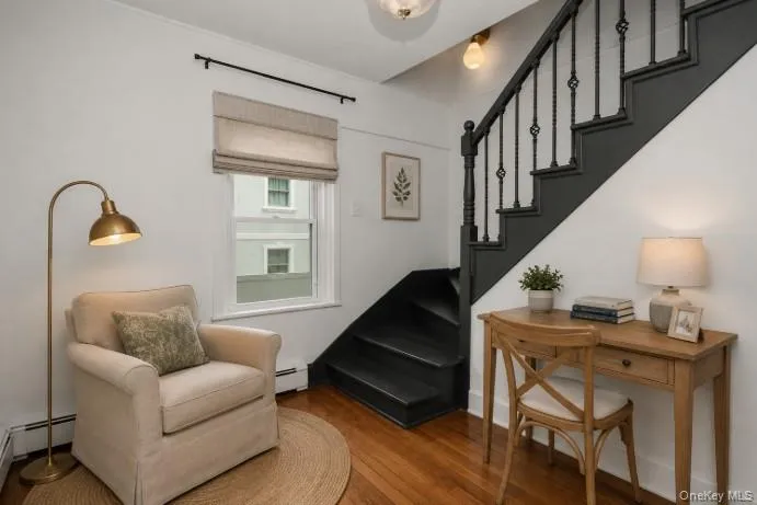 Nook at the foot of the stairs Virtually Staged Nook at the foot of the stairs Virtually Staged