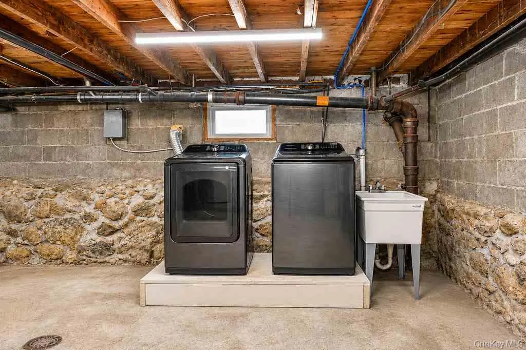 Laundry in basement - appliances less than 1yr old. Laundry in basement - appliances less than 1yr old.
