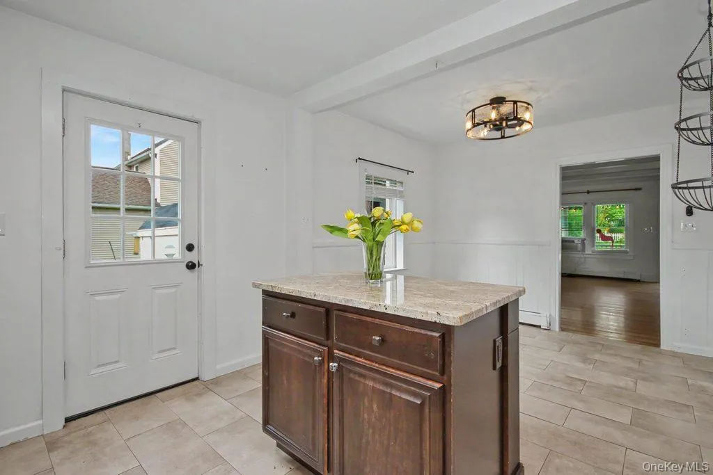 Kitchen door out to the very spacious rear deck w/a few steps down to the back yard. Kitchen door out to the very spacious rear deck w/a few steps down to the back yard.