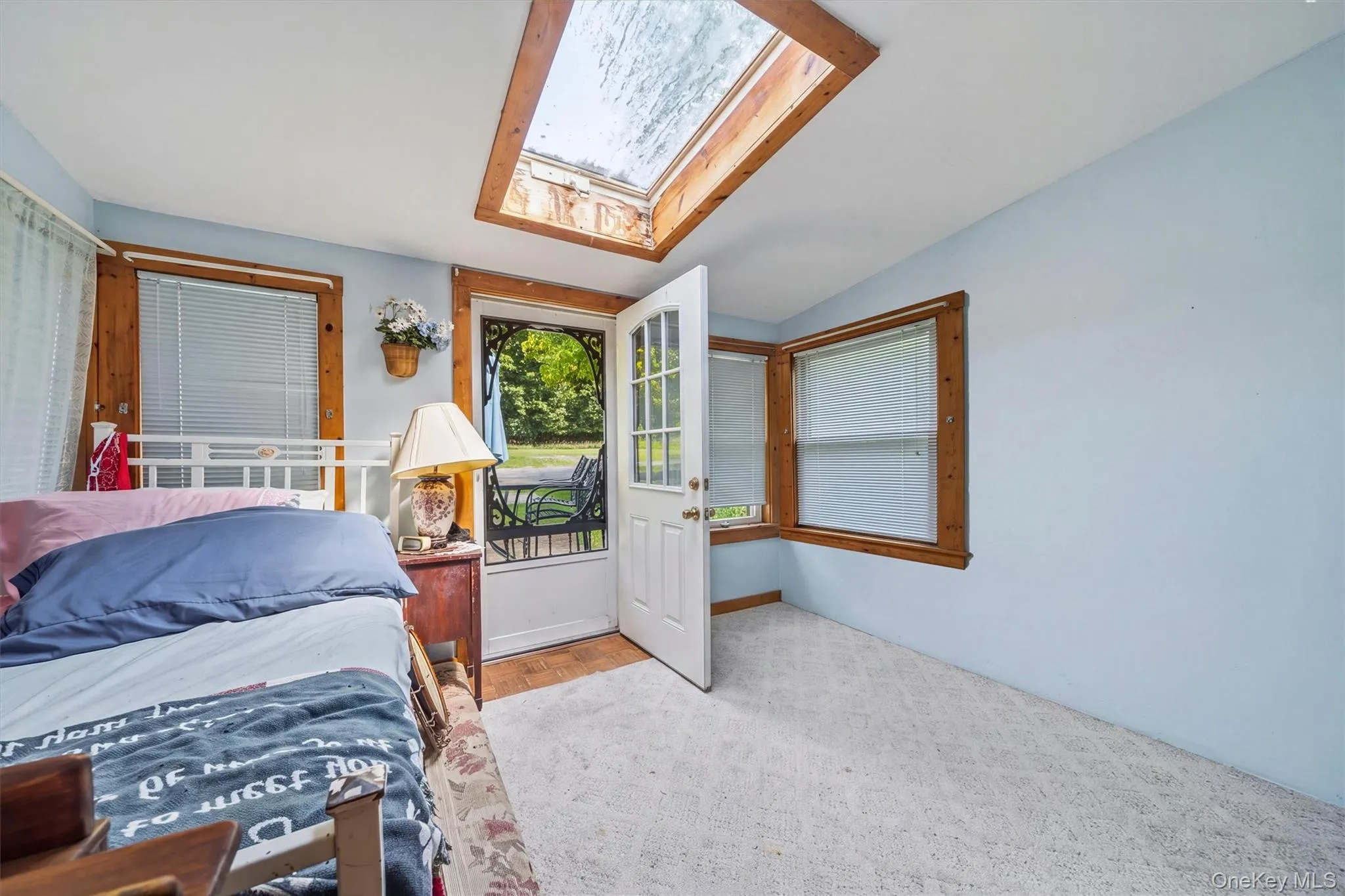 1st Floor Bedroom w/ Outside Access & Skylight 1st Floor Bedroom w/ Outside Access & Skylight