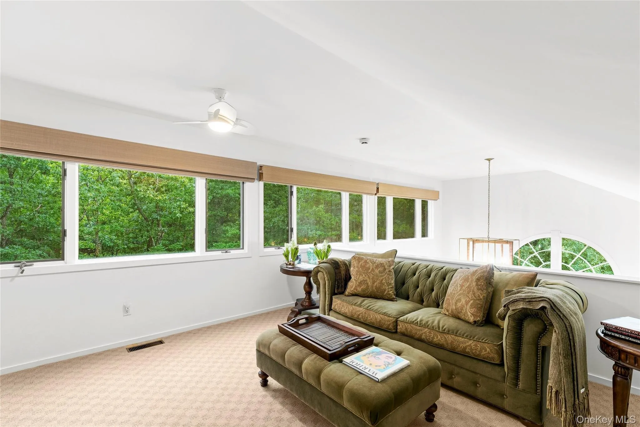 Second level family room overlooks the living room Second level family room overlooks the living room