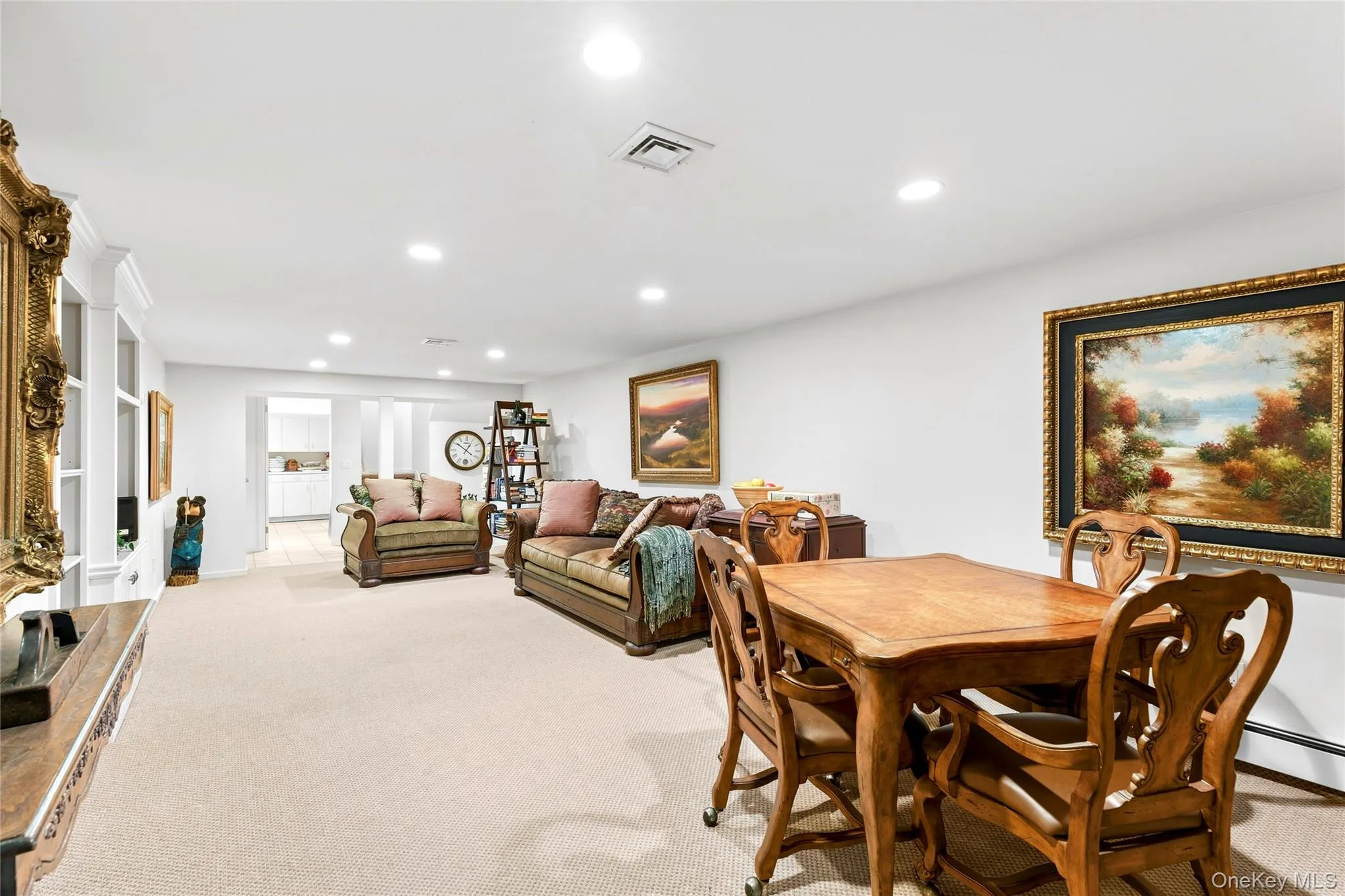Recreation room with access to yard through Bilco doors, cedar closet, laundry room, utility/storage room, full bath Recreation room with access to yard through Bilco doors, cedar closet, laundry room, utility/storage room, full bath