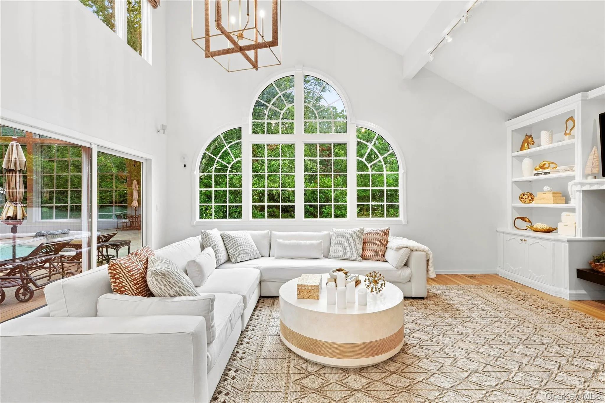 Bright Living room with vaulted ceiling and hardwood floors Bright Living room with vaulted ceiling and hardwood floors