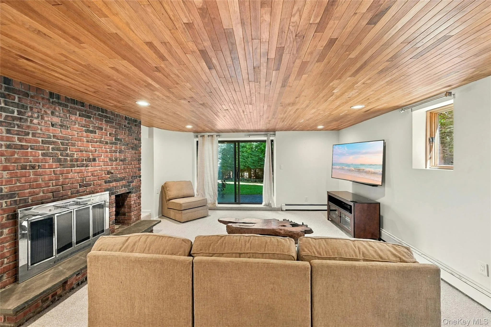 Lower Level Living Space with Fireplace Lower Level Living Space with Fireplace