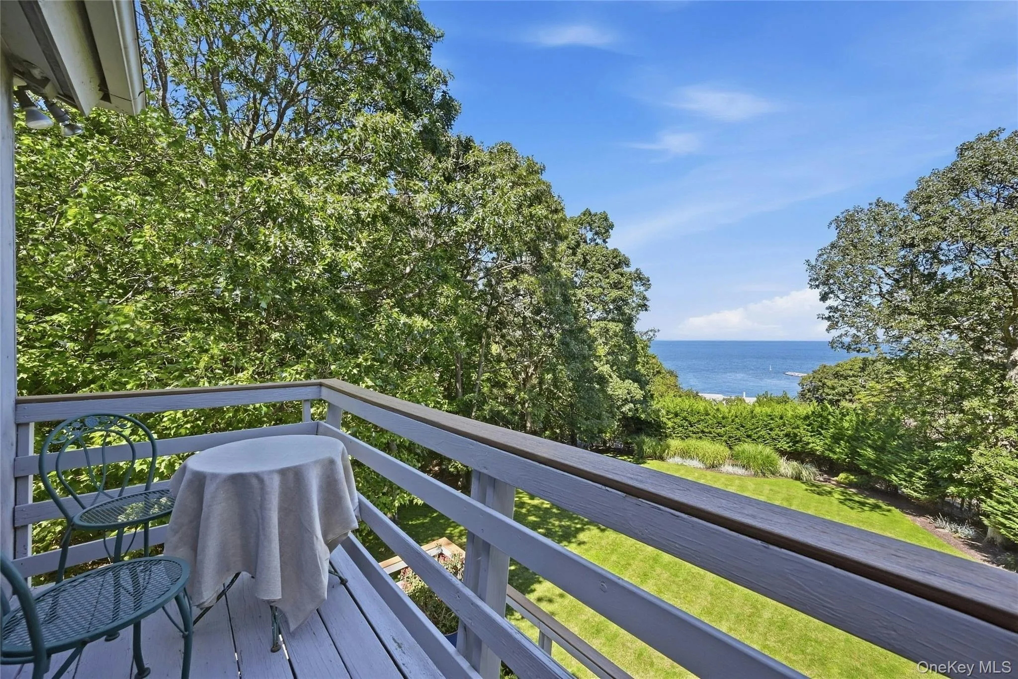 Primary Bed Private Balcony with Water Views Primary Bed Private Balcony with Water Views