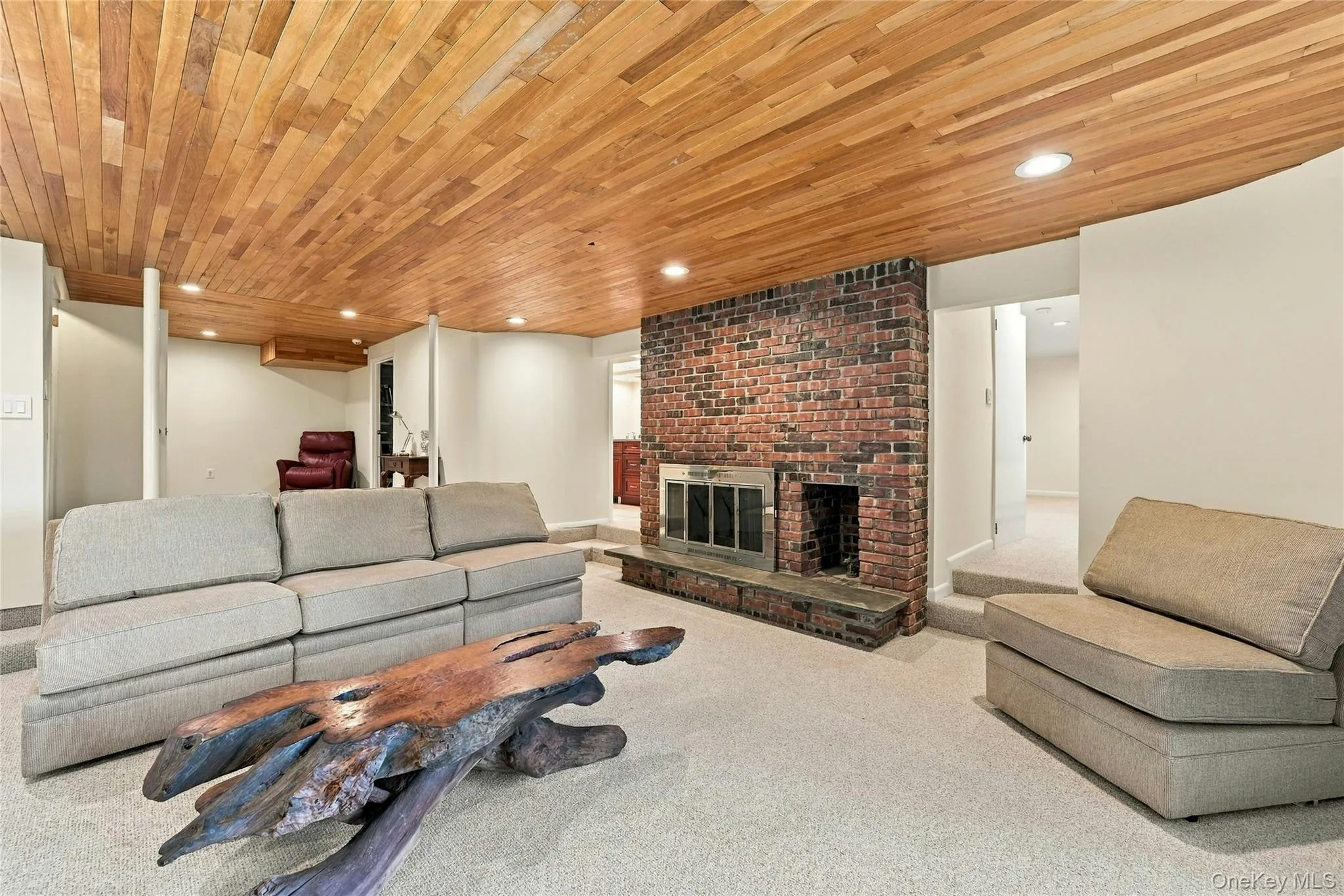 Lower Level Living Space with Fireplace Lower Level Living Space with Fireplace