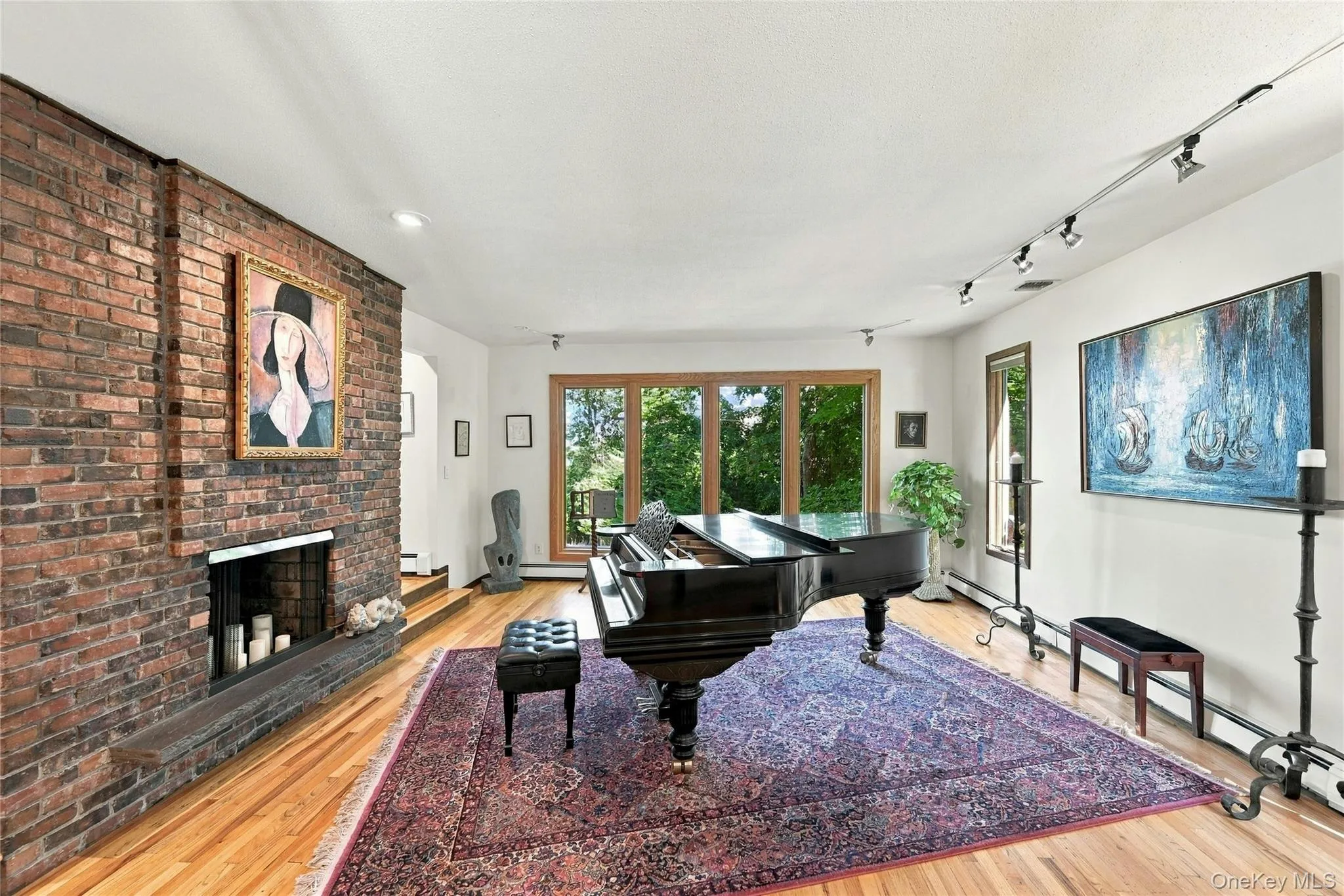 Formal Living Room with Double Sided Fireplace Formal Living Room with Double Sided Fireplace