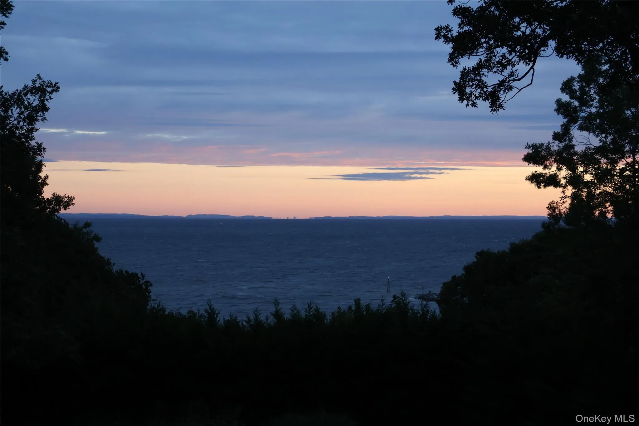 Sunrise from the Balcony with Connecticut Across the Water Sunrise from the Balcony with Connecticut Across the Water