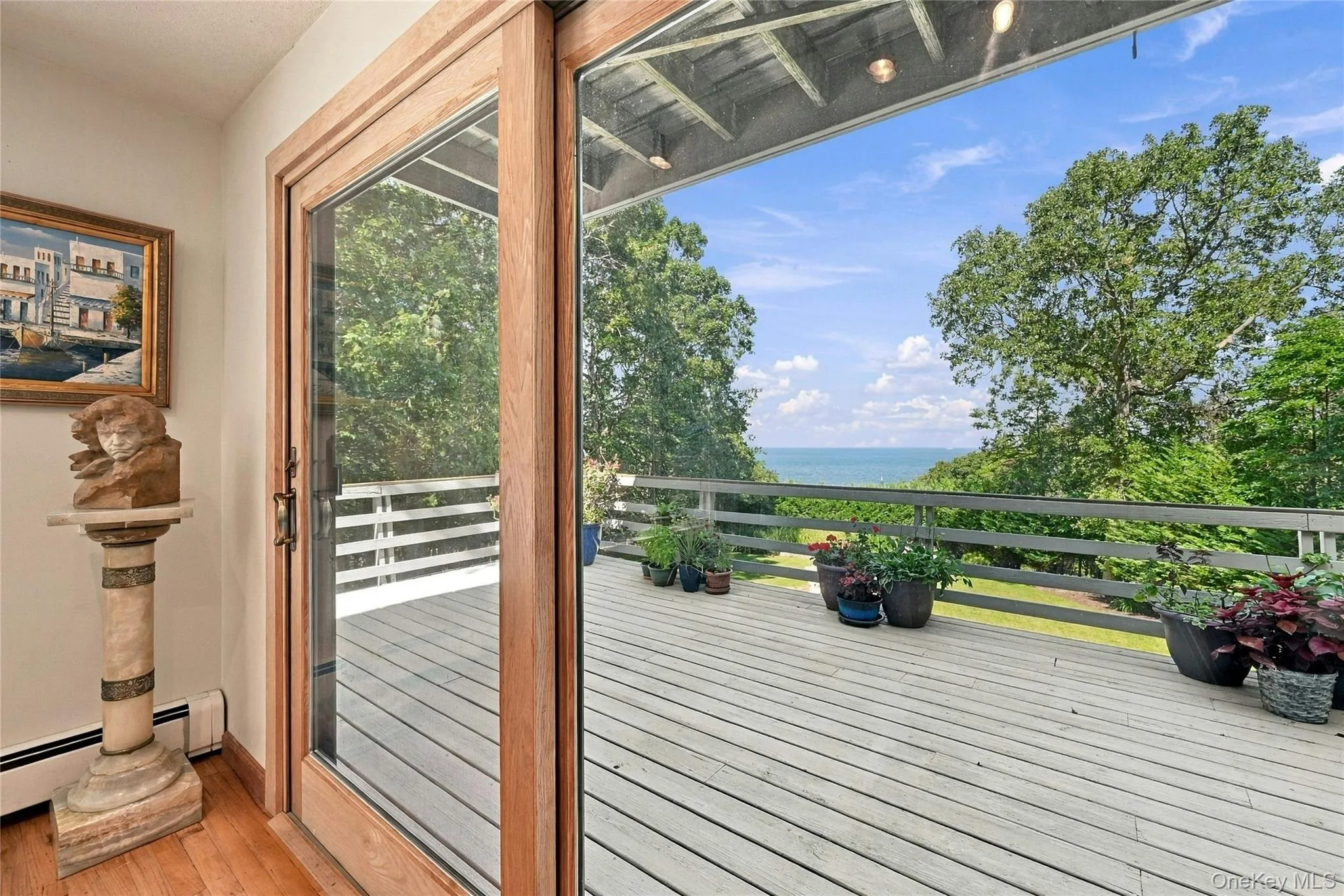 Balcony off Formal Dining with Sliding Doors and Water Views Balcony off Formal Dining with Sliding Doors and Water Views