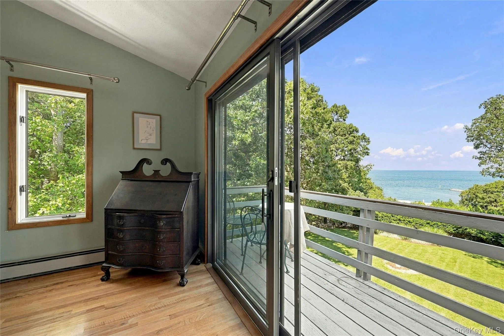 Primary Bed Private Balcony with Water Views Primary Bed Private Balcony with Water Views