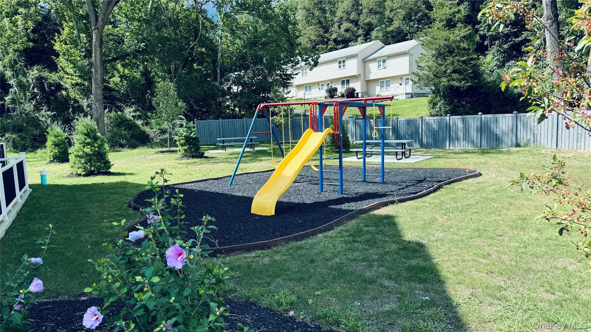View of playground with a lawn View of playground with a lawn