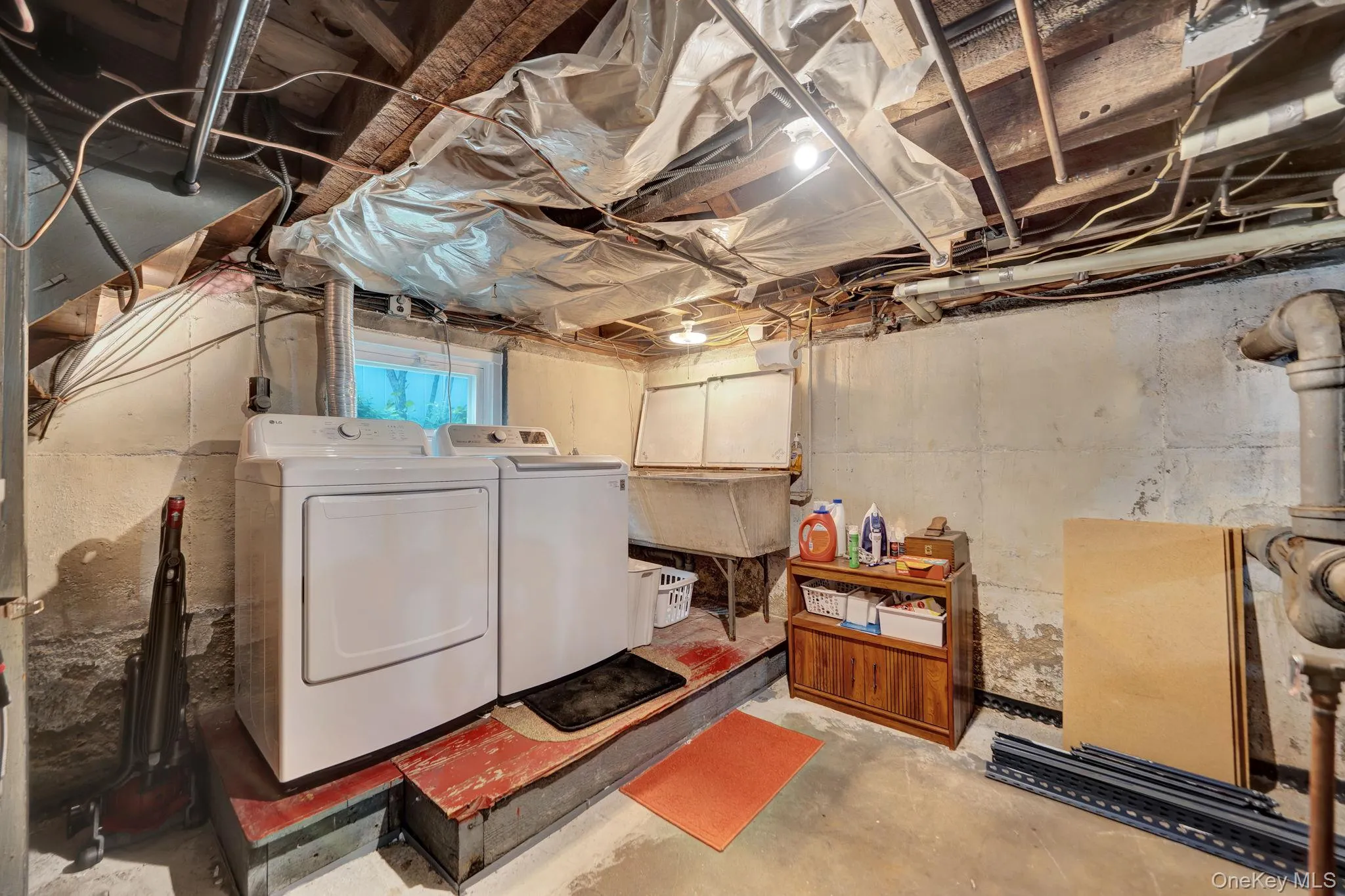 Laundry room in basement Laundry room in basement