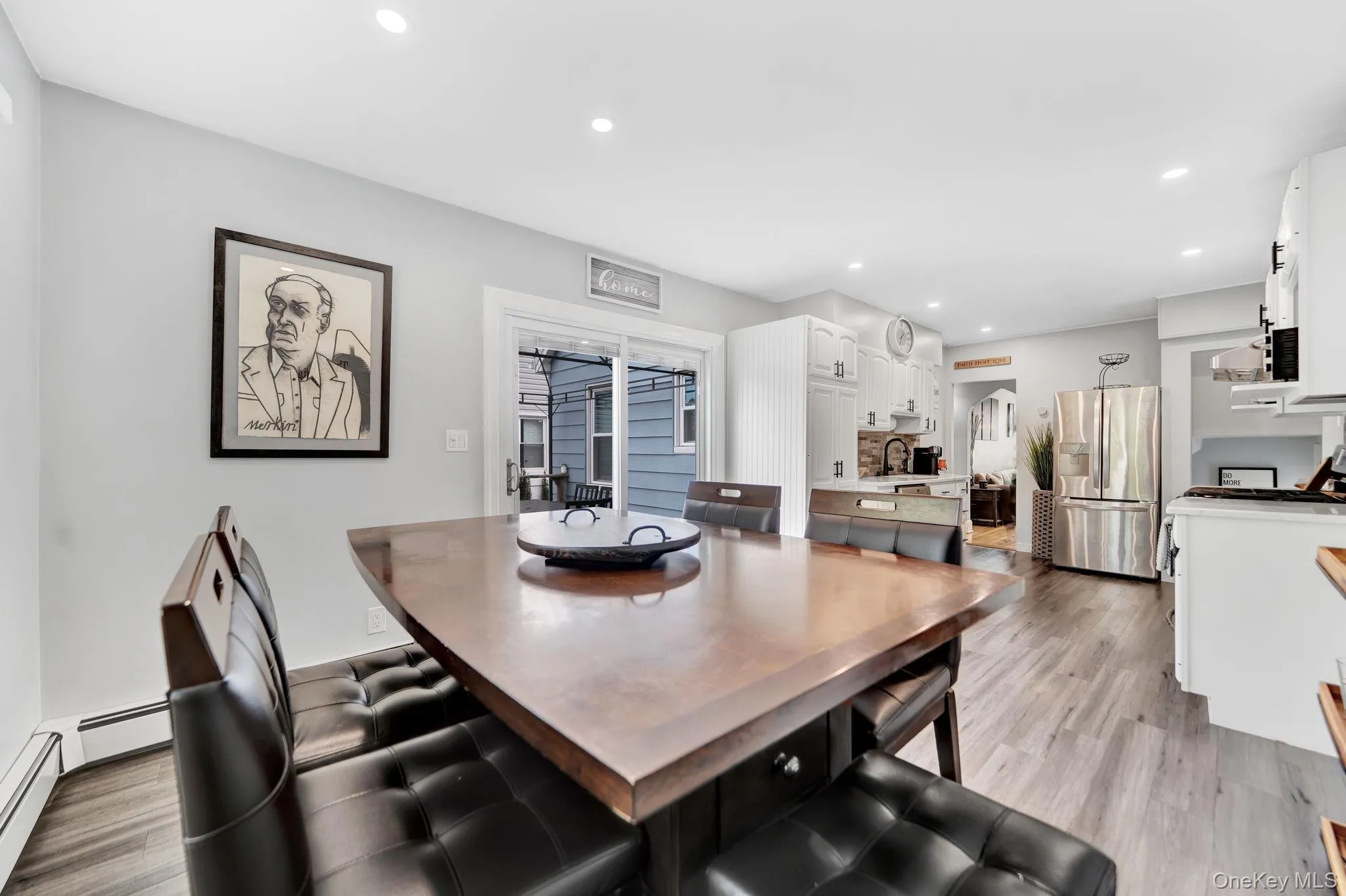 Eat in kitchen featuring sliding doors to deck Eat in kitchen featuring sliding doors to deck