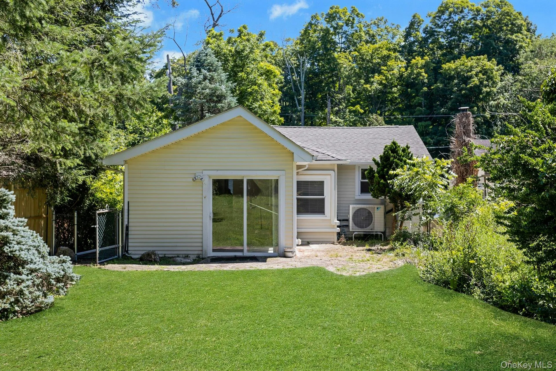 sliding doors on rear of home Exterior door to kitchen. Patio sliding doors on rear of home Exterior door to kitchen. Patio