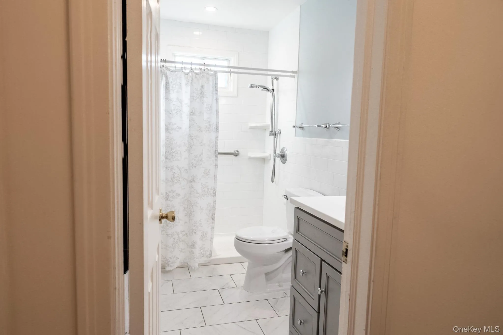 Updated Bathroom with Tiled floor and wall, Walk-in shower Updated Bathroom with Tiled floor and wall, Walk-in shower
