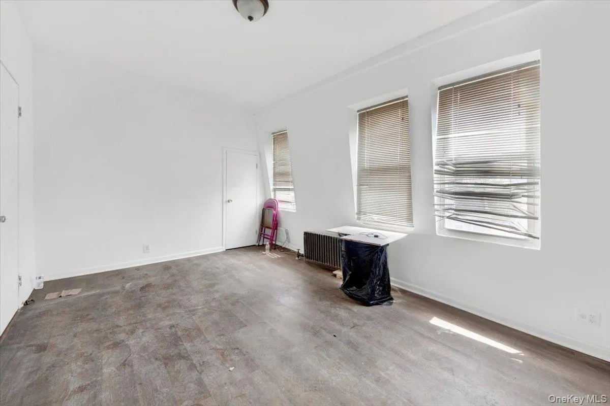 Spare room featuring baseboards Spare room featuring baseboards