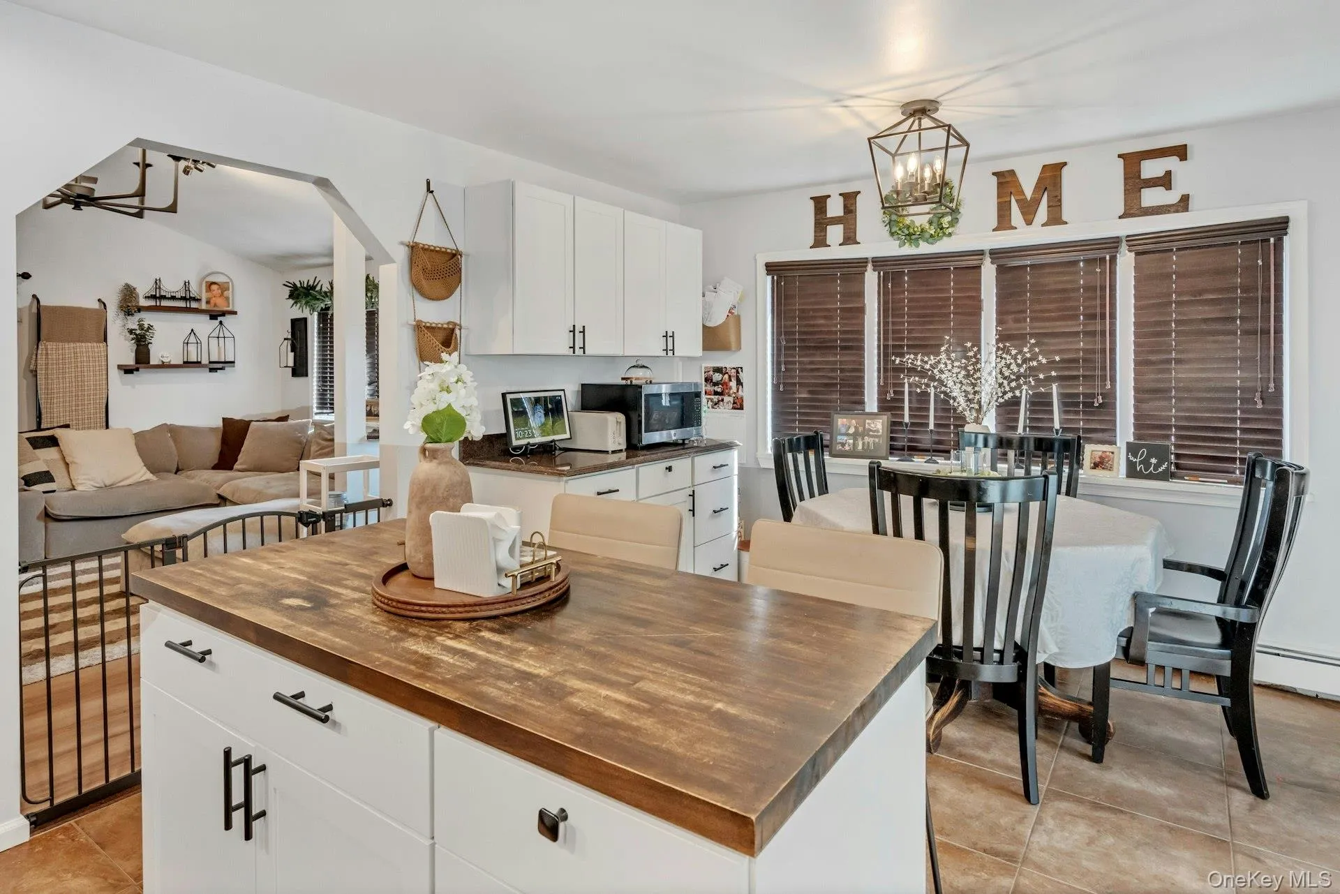 Kitchen with dining area and extended cabinets for storage Kitchen with dining area and extended cabinets for storage
