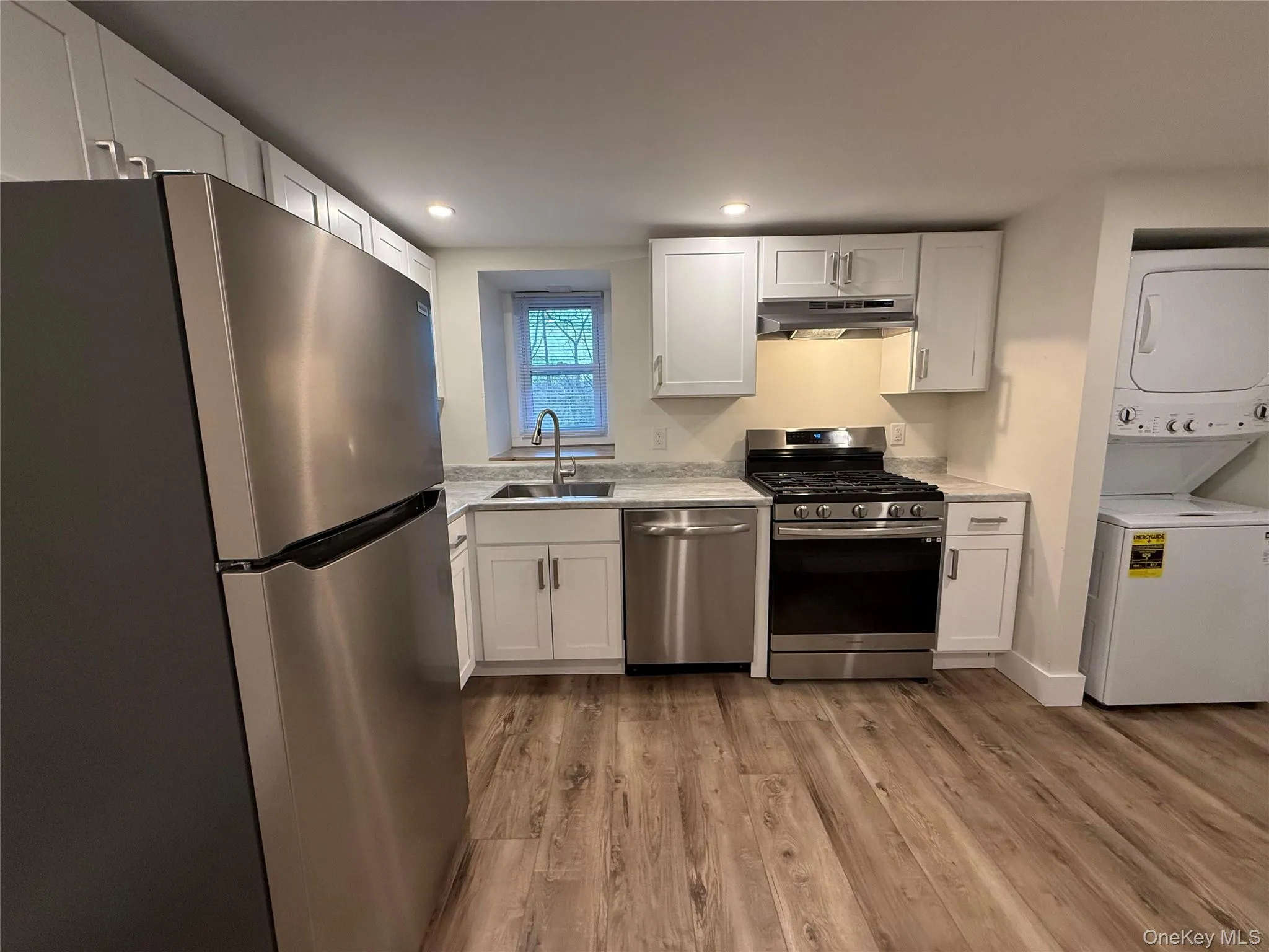 Kitchen with an outside view of the window Kitchen with an outside view of the window