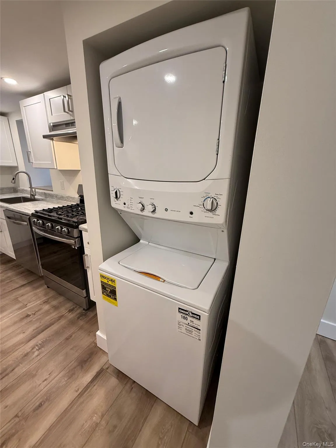 Stackable laundry entering into kitchen Stackable laundry entering into kitchen