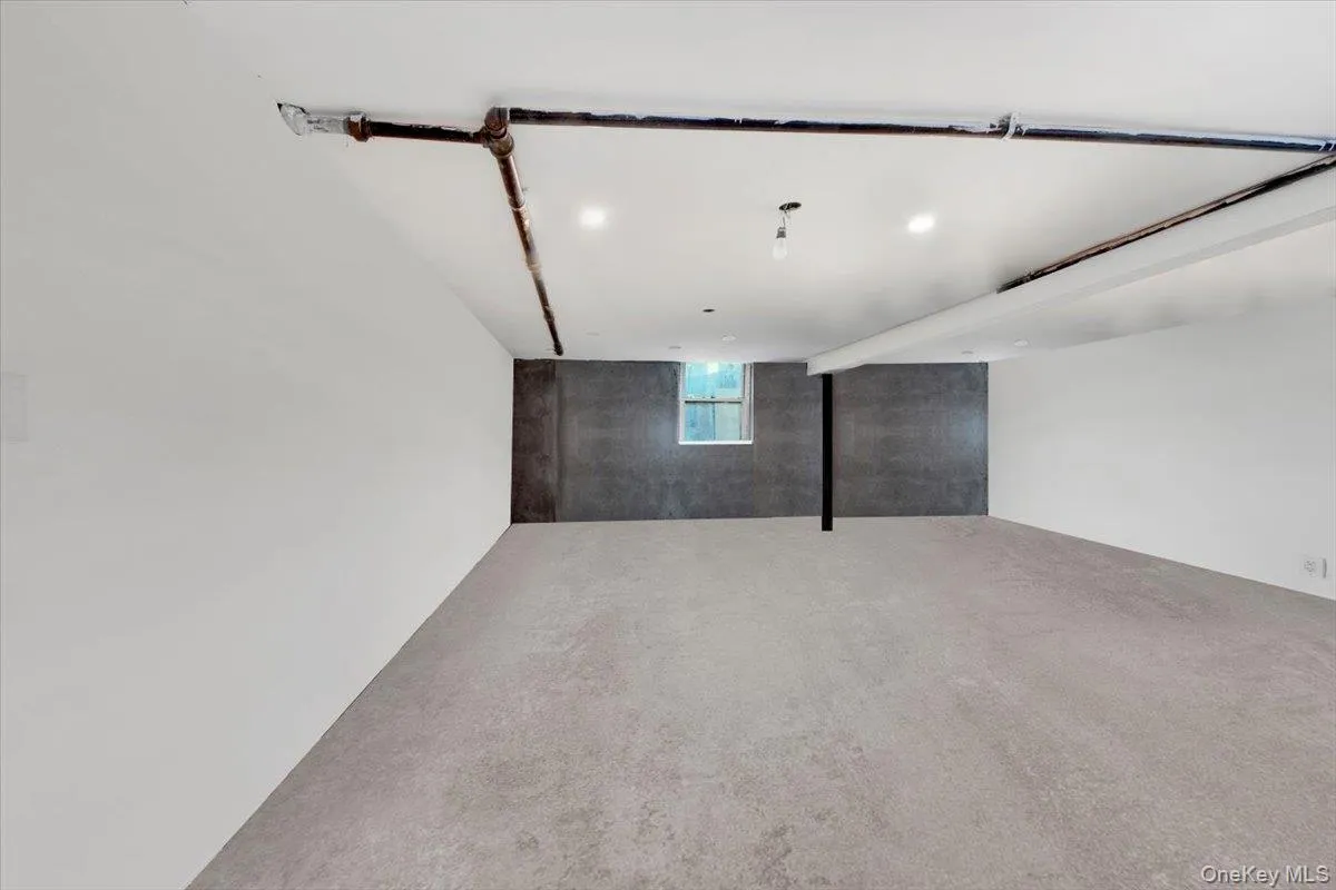 Below grade area with carpet Below grade area with carpet