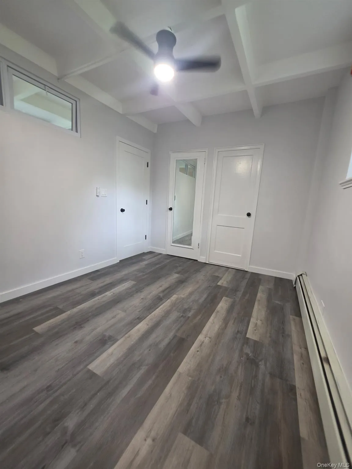 Newly Installed Vinyl Flooring over Original wooden parquet and concrete base. Newly installed lighting fan. Freshly painted walls and doors and concrete ceiling. Newly Installed Vinyl Flooring over Original wooden parquet and concrete base. Newly installed lighting fan. Freshly painted walls and doors and concrete ceiling.