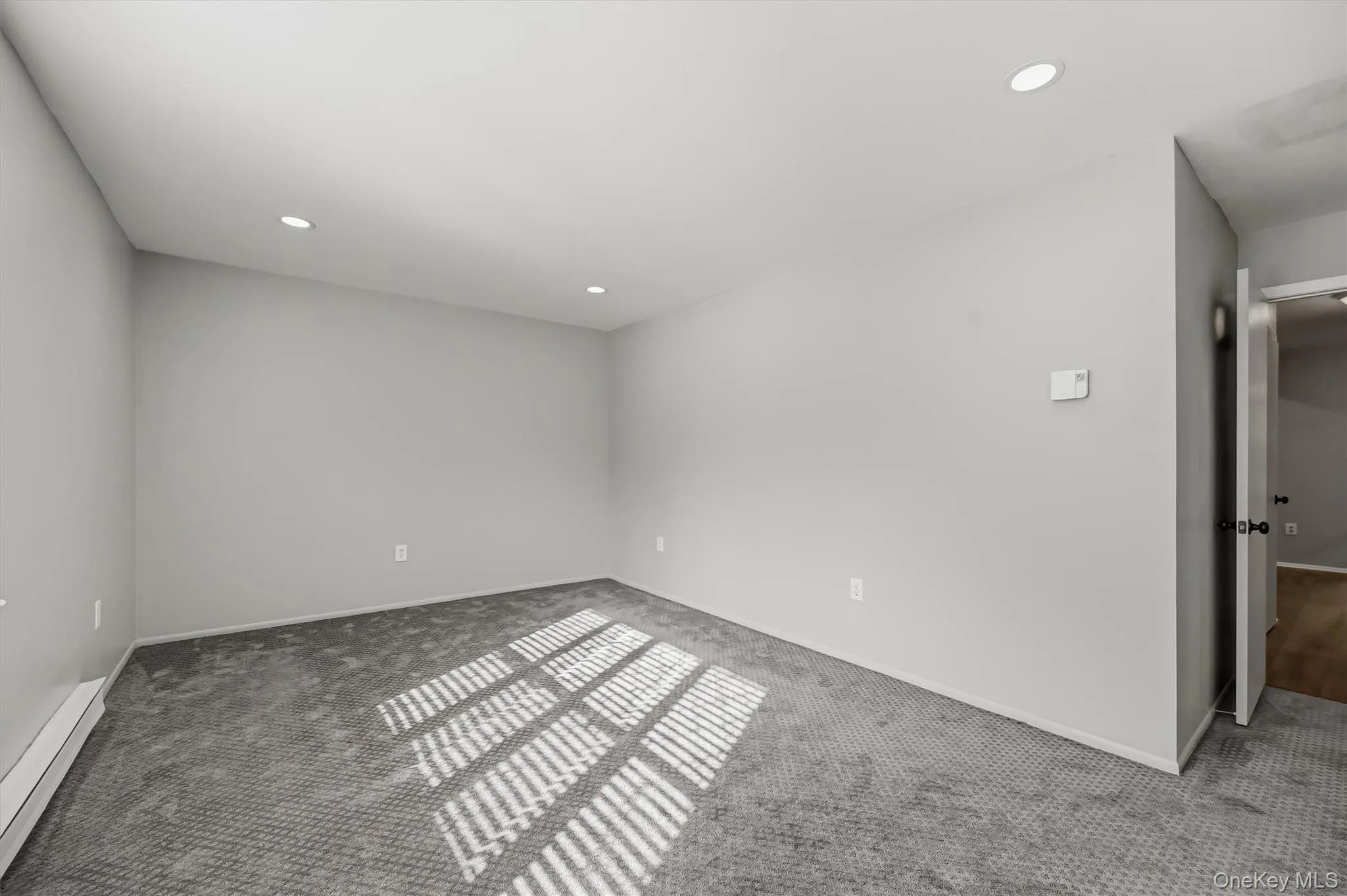 Spacious primary bedroom filled with natural light. Spacious primary bedroom filled with natural light.