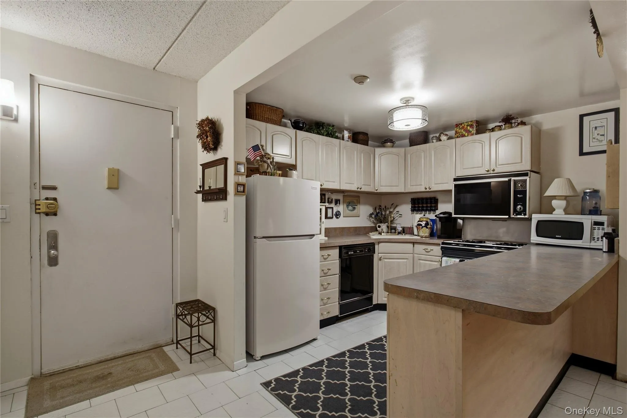 Entry and Kitchen Entry and Kitchen