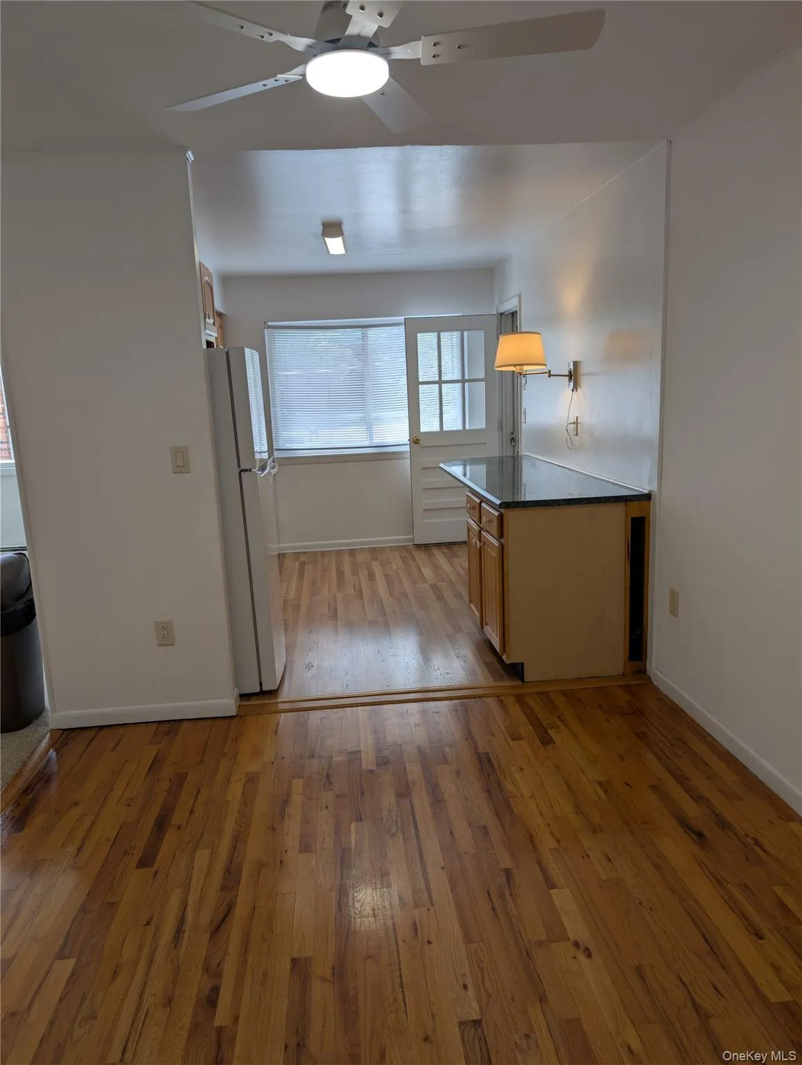 Dining room opens to kitchen and living room Dining room opens to kitchen and living room