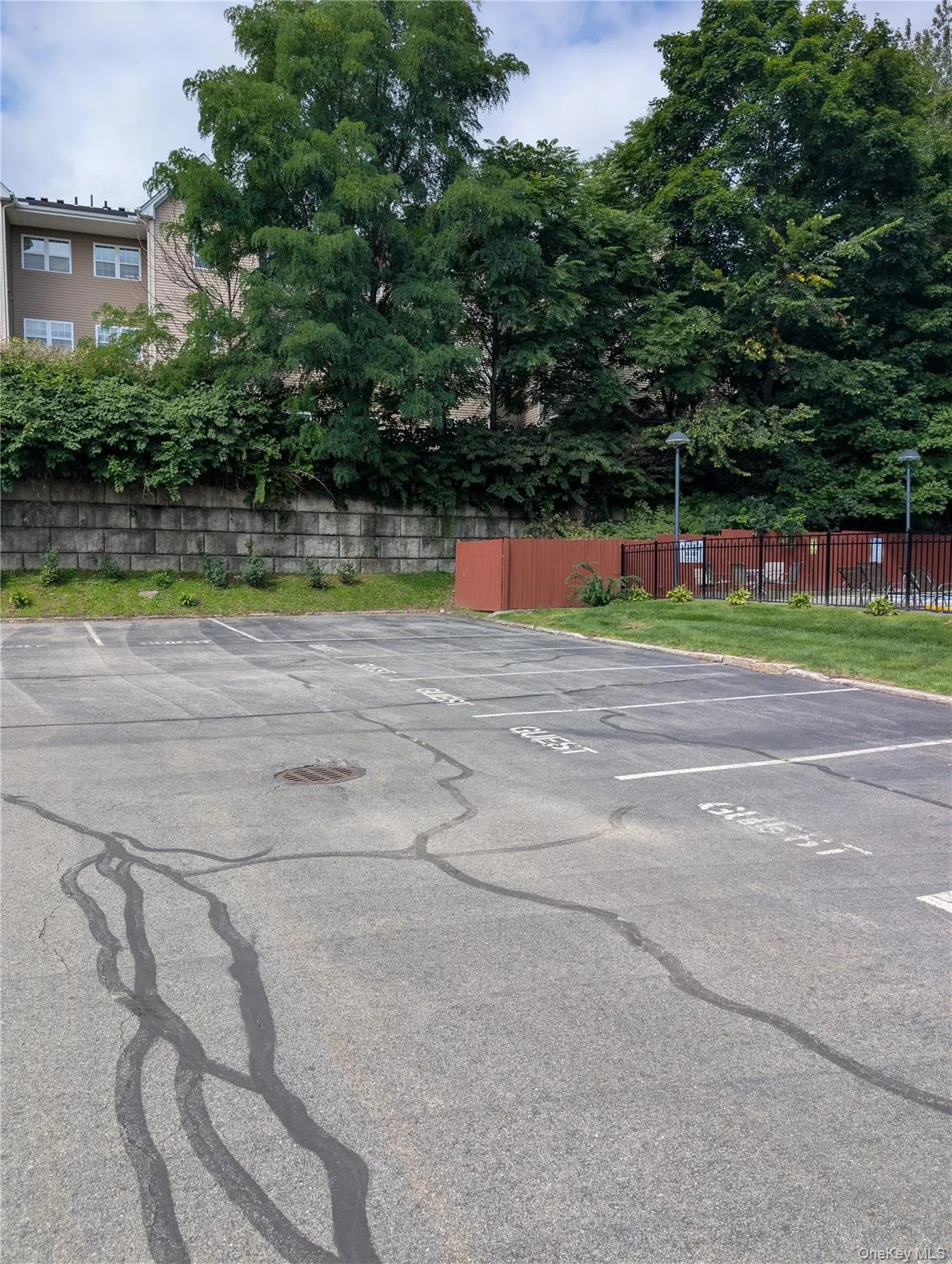 9 guest parking spaces near the pool area 9 guest parking spaces near the pool area