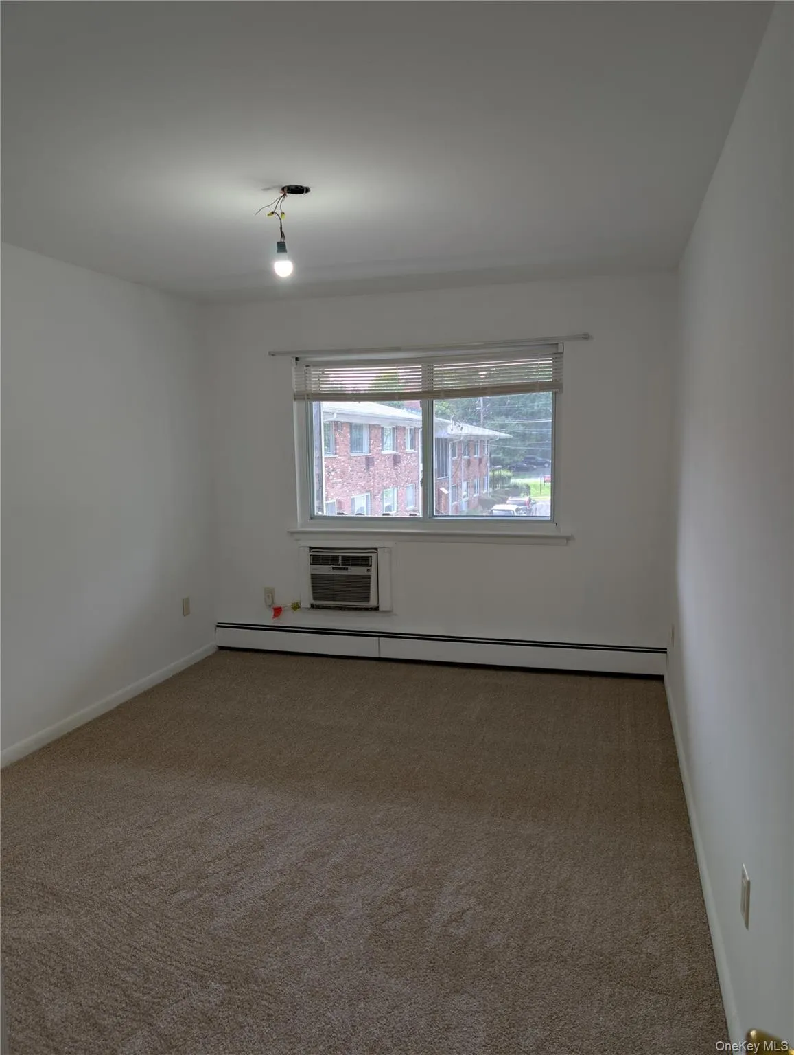 New carpeting over hardwood floors, wall air conditioner and new ceiling fan/light fixture New carpeting over hardwood floors, wall air conditioner and new ceiling fan/light fixture