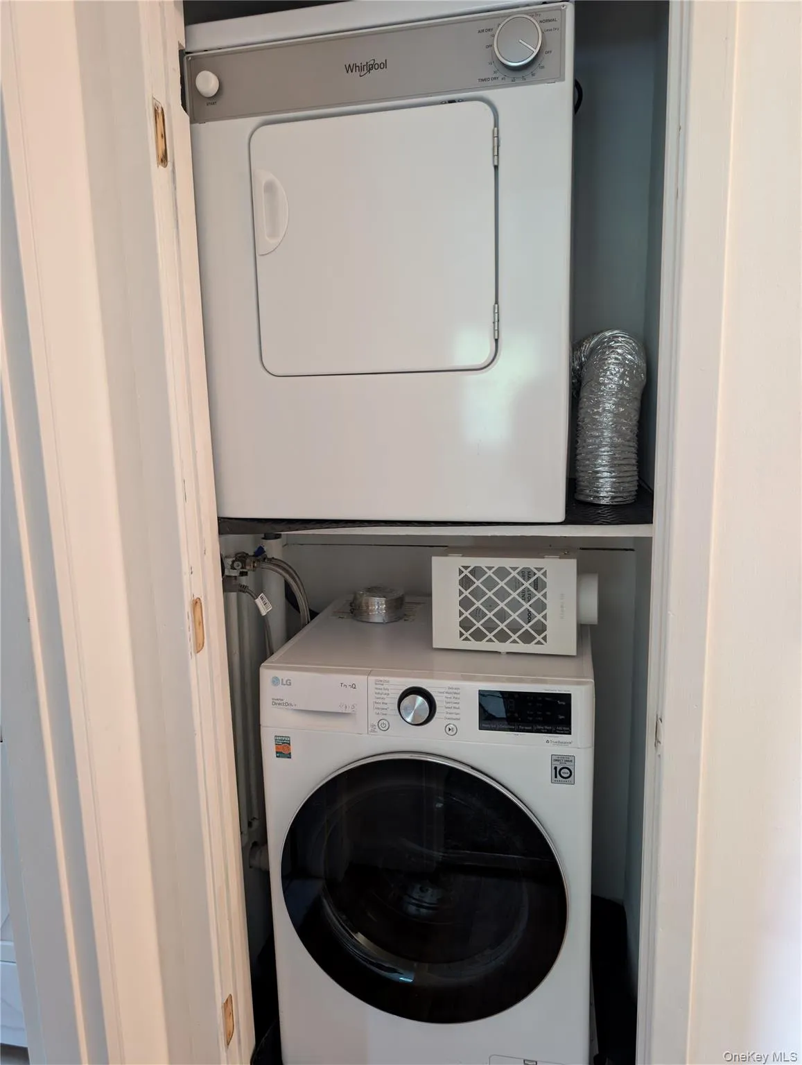 Full size washer and dryer just off primary bedroom Full size washer and dryer just off primary bedroom