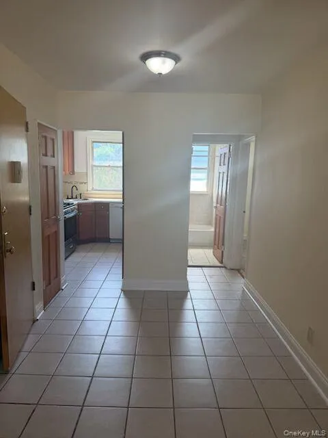 This entry foyer can be utilized as a dining foyer or office space. This entry foyer can be utilized as a dining foyer or office space.