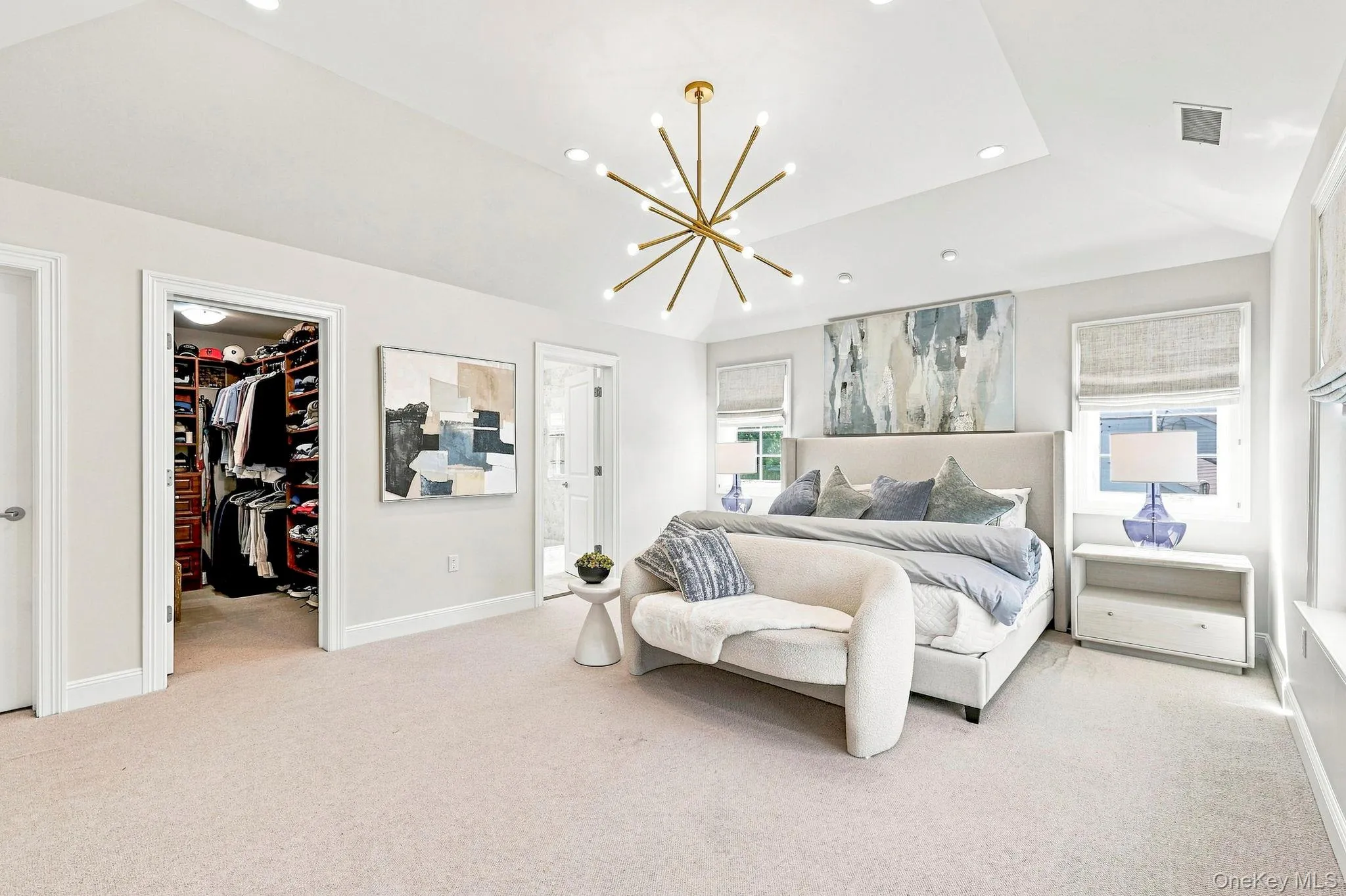 Primary Bedroom with ensuite and his and her walk-in closets. Primary Bedroom with ensuite and his and her walk-in closets.