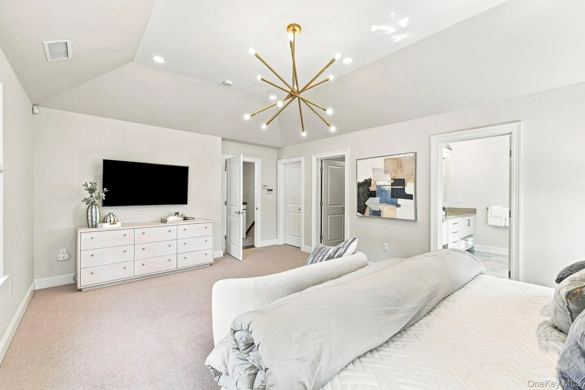 Primary Bedroom with ensuite and his and her walk-in closets. Primary Bedroom with ensuite and his and her walk-in closets.