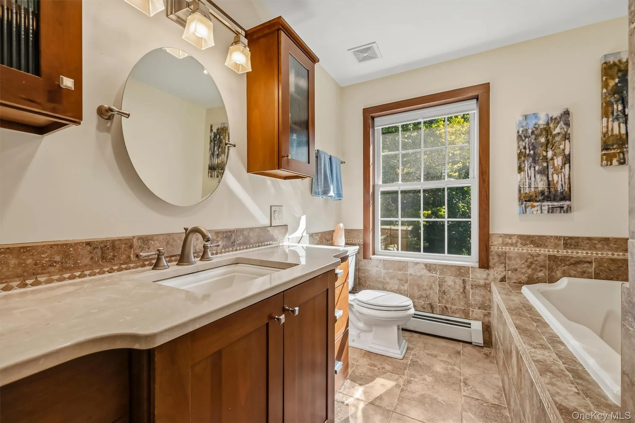 Light-filled primary bath offers a peaceful retreat. Light-filled primary bath offers a peaceful retreat.